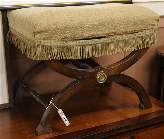 A Regency style mahogany X framed dressing stool